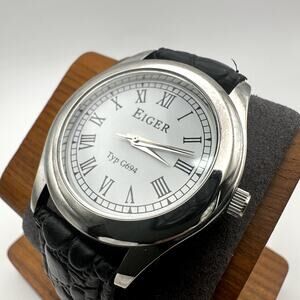 Eiger Typ G694 Silver Tone Quartz Watch White Dial Roman Numerals Black Strap